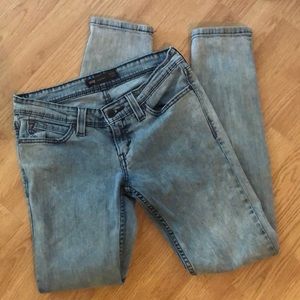 Levi’s Demi curve low rise skinny acid wash jeans
